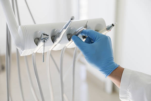 Professional Tooth Extraction technician working in Merlin, OR